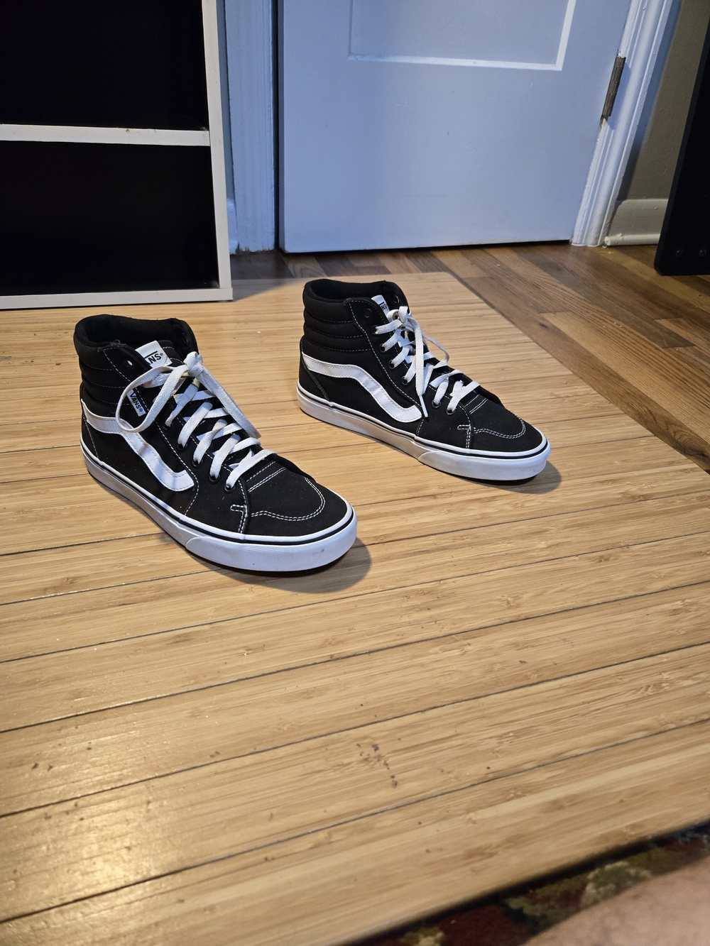 Vans Black and White High-Top Skate Sneakers